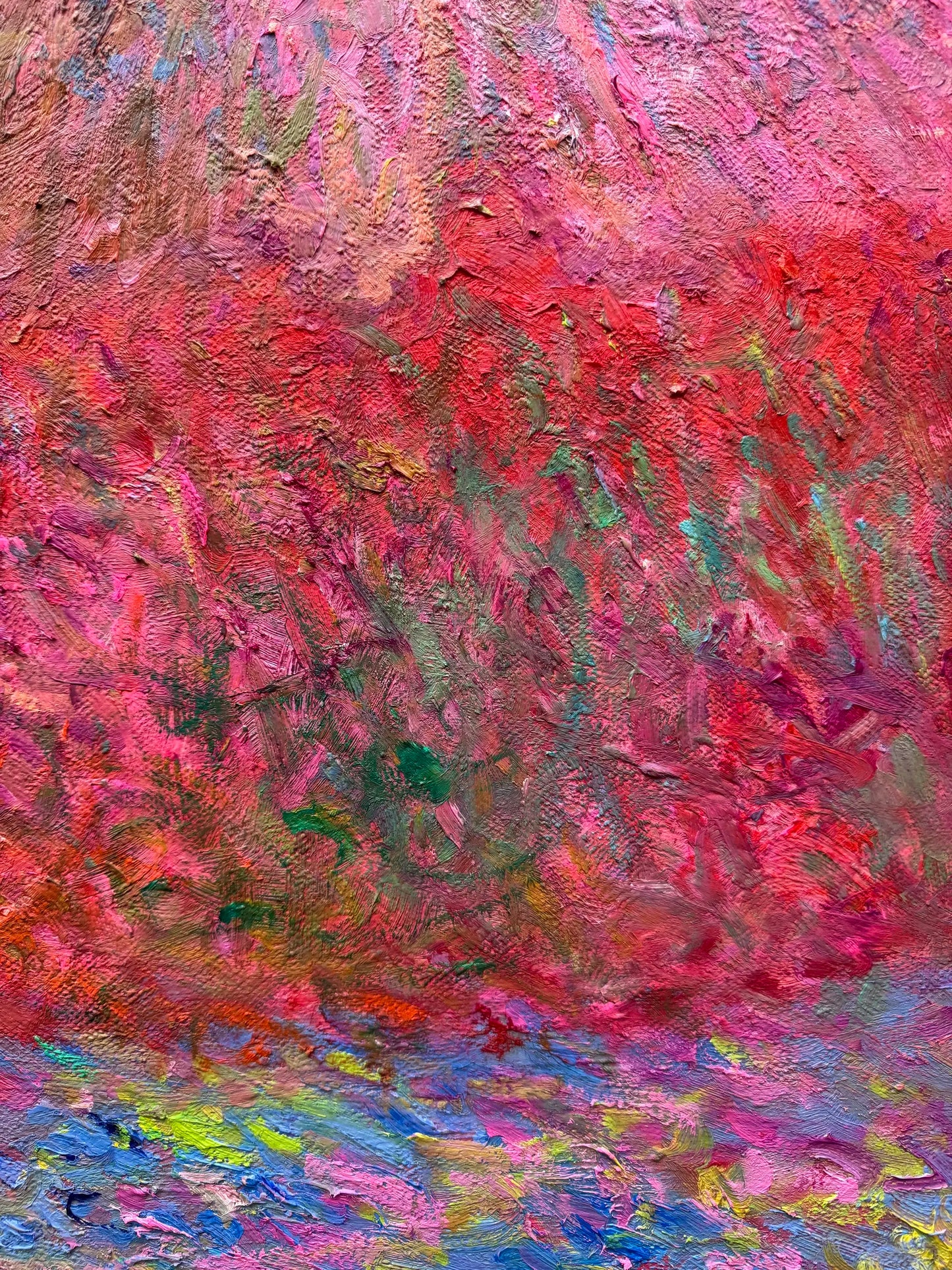 Partial view of 'Haystacks' painting, focusing on the colorful foreground field