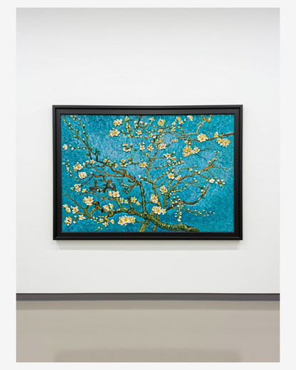 Framed Van Gogh Almond Blossomsreproduction canvas art on a cleangallery wall